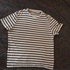 White/ Black striped t-shirt.